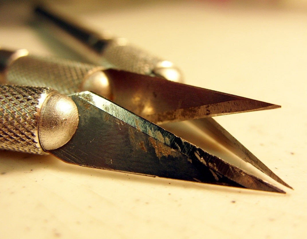 close-up of three scalpel tool blades