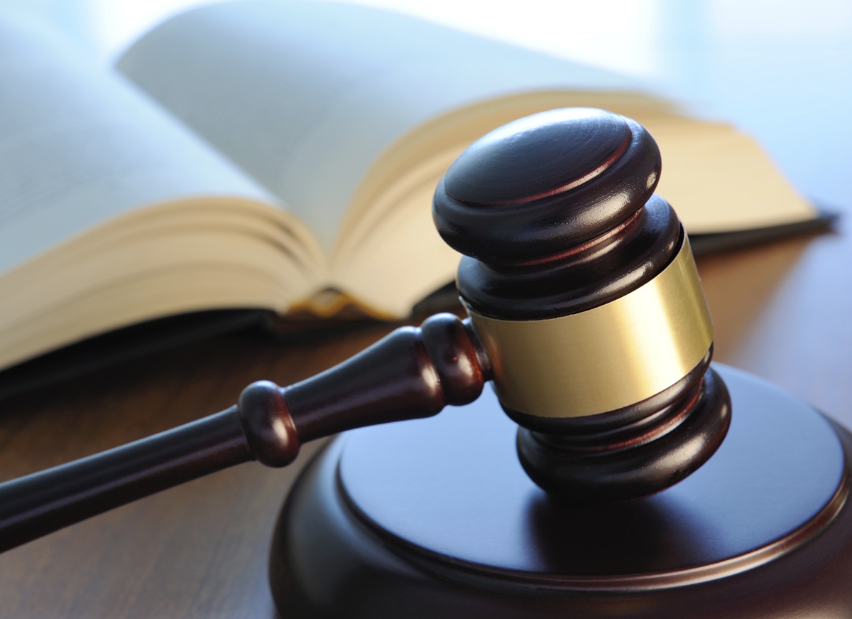 legal gavel, books and scales on a desk